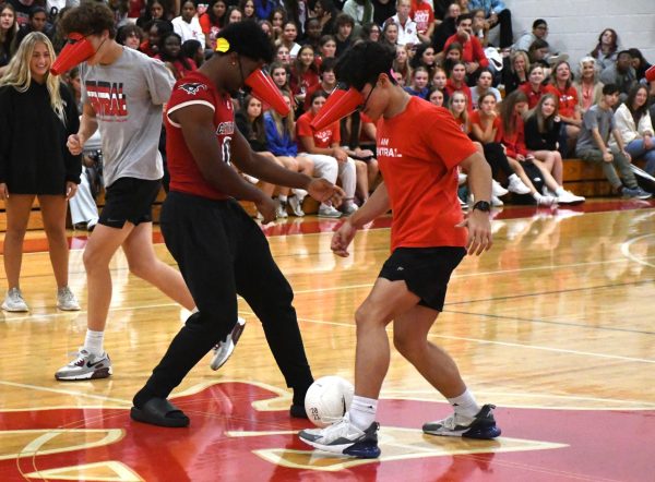 Senior Trevion Taylor attempts to steal the ball from Juan Escalante (11) during Cyclop Soccer at the pep rally on Sept. 13.