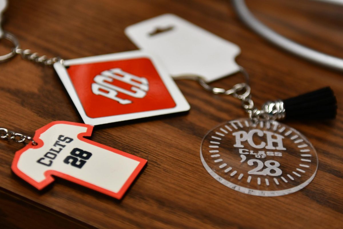 Colts jersey, Class of ‘28, and PCH-designed keychains for sale at the school store.