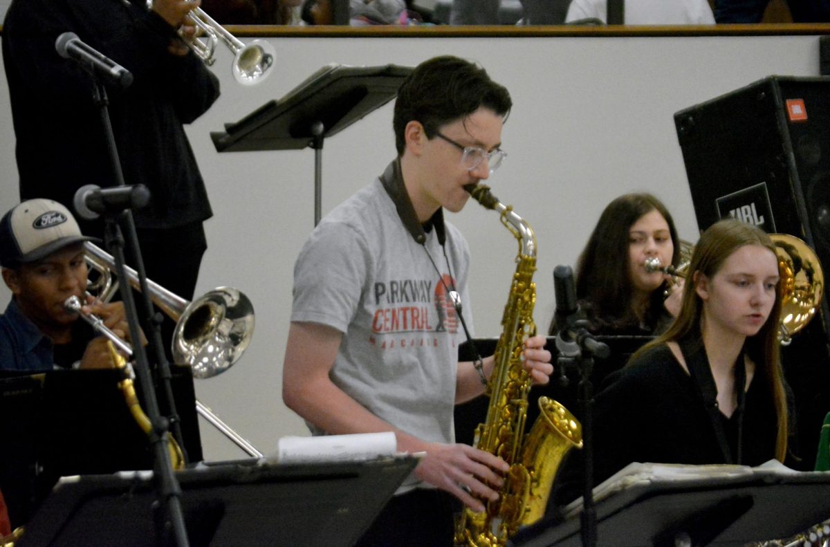 Junior Ben Green plays solo during jazz band's lunch performance on Nov. 26.