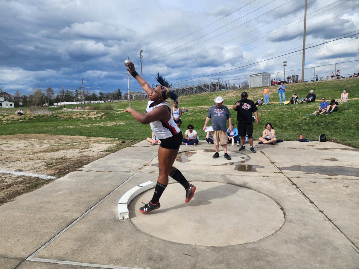 Priya Cheatham (11) throws shot put at the Parkway Quad on March 28. 