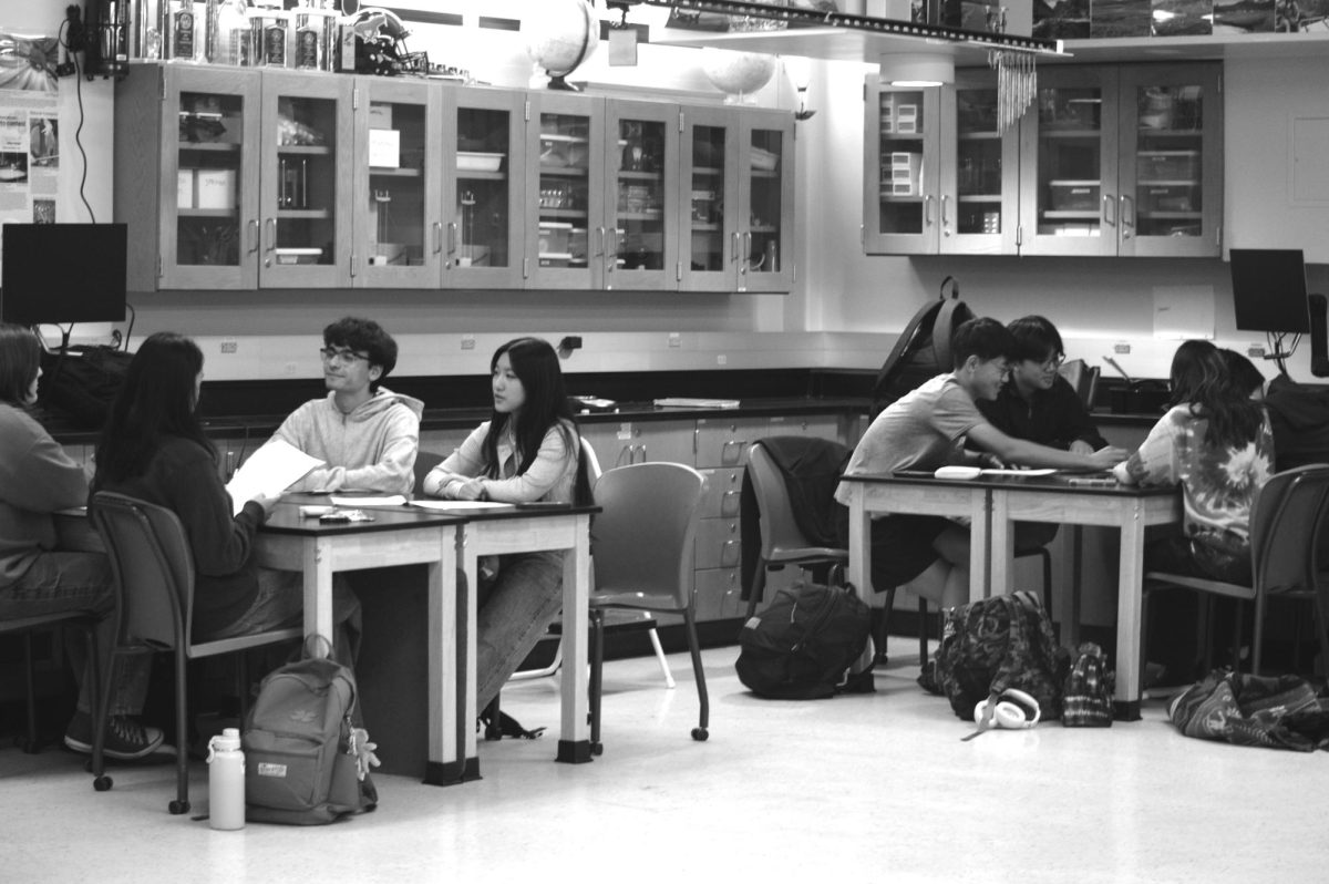 Students Jessica Knobbe (11), Gelian Pondoc (11), Lior Birka (11), Emily Wong (11), Caden Kim (10), Ethan Lau (10), Thaniskaa Piruthiviraj (10) and Henry Dong (10) work in Jennifer Meyer's AP Physics class on May 6. 