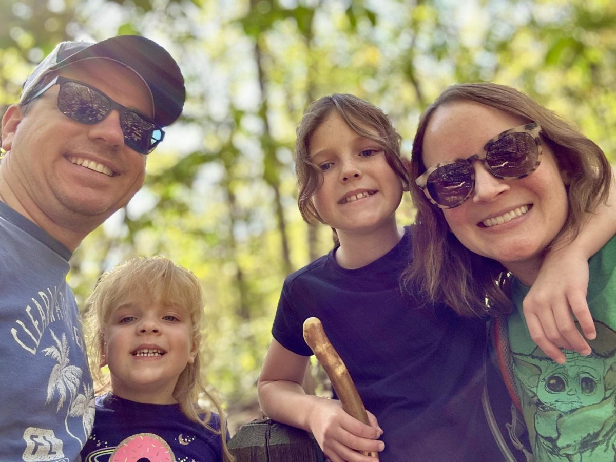 Courtney Hill posing with her husband and two daughters. Photo courtesy of Courtney Hill
