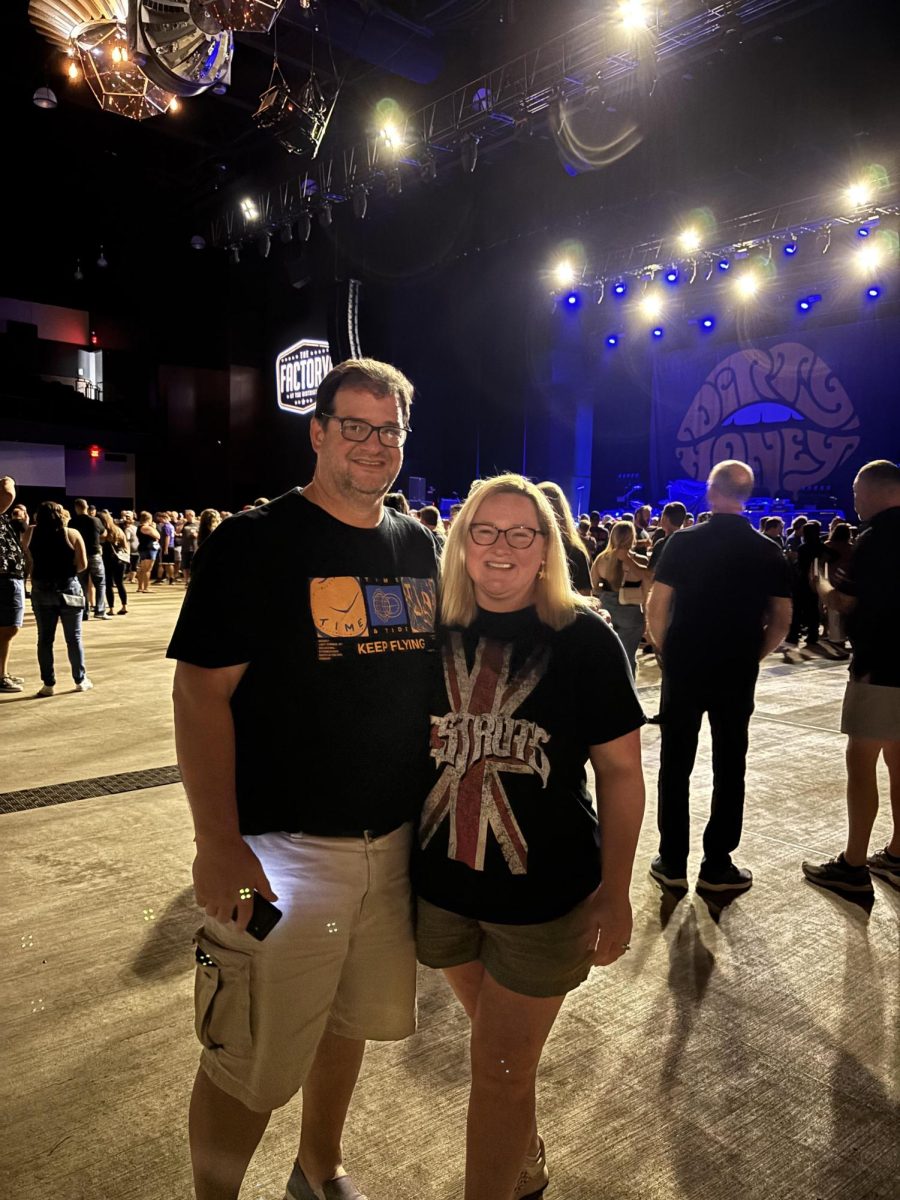 New building substitute Amy Utterson attends a MCR concert in Chicago with her husband on Aug. 28. In her free time, she loves traveling to see different bands around the country. Photo courtesy of Amy Utterson