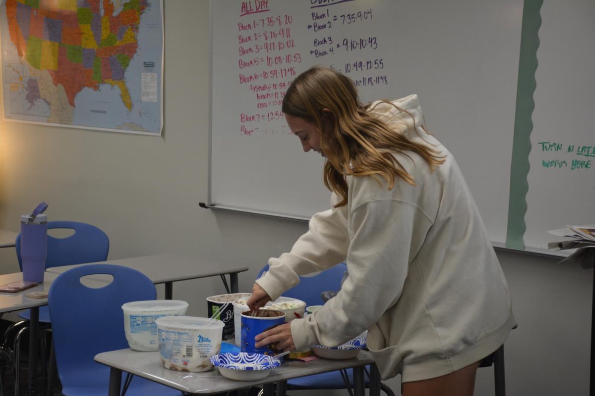 Mya Hoff tries various ice cream flavors for the first meeting of the Ice Cream Club in October. 