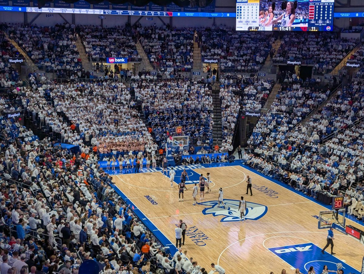 The crowd roars at Chaifetz Arena as Saint Louis jumps out to an 11 point lead against Dayton on Jan. 30. The annual “Billiken Blizzard” event had 10,277 show up to find a free white t-shirt on their seats before the biannual Arch-Baron Cup rivalry game.