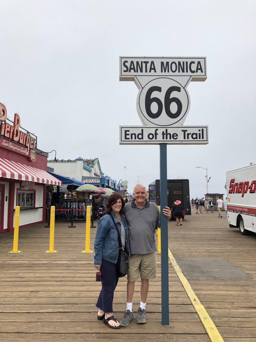 Mike and Lucia Tremont pose at the end of Route 66 at the Santa
Monica Pier in California. They enjoyed resting at the Pacific Ocean
after their month long trip.